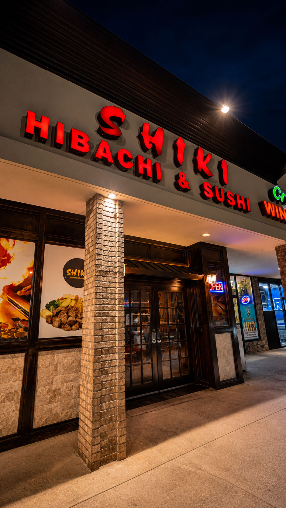 Shiki Hibachi & Sushi illuminated at night